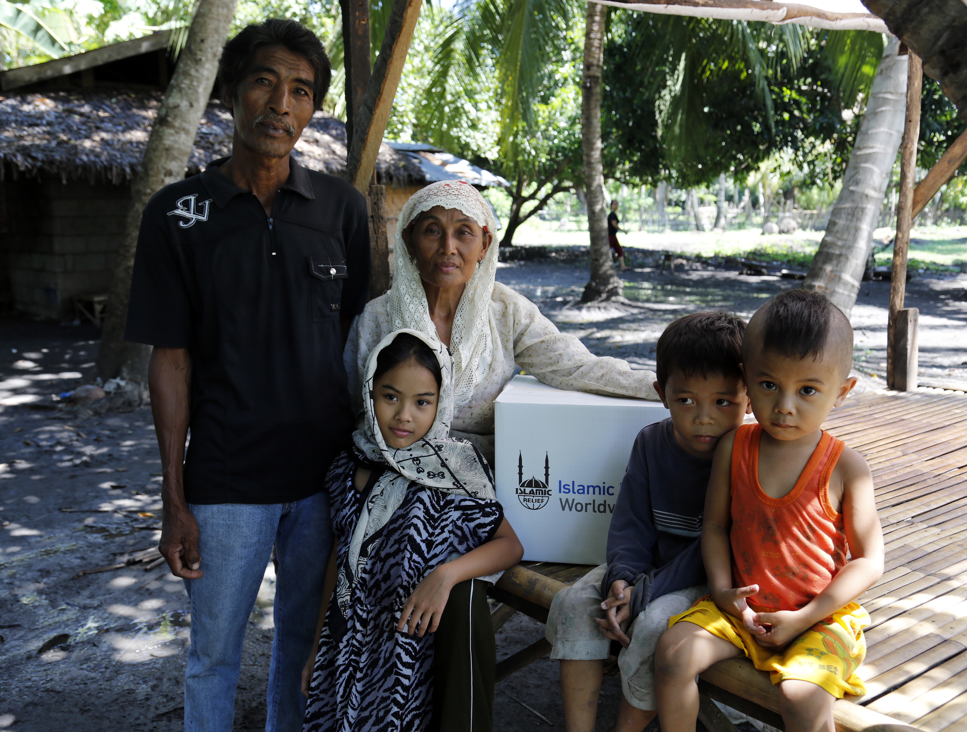 Samia Batua and her family at their home in Galakit, Pagalungan.